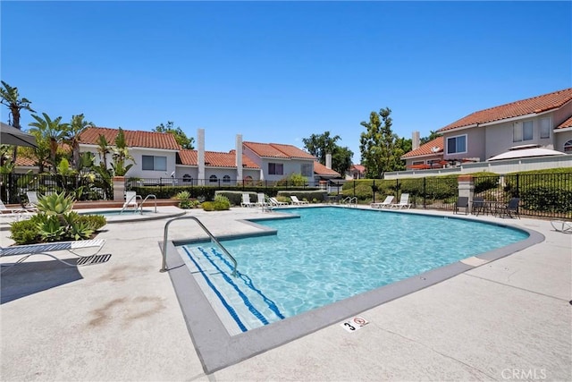 62 Wild Horse Loop Unit 29, Rancho Santa Margarita, CA 92688 - community pool featuring a patio area and a residential view