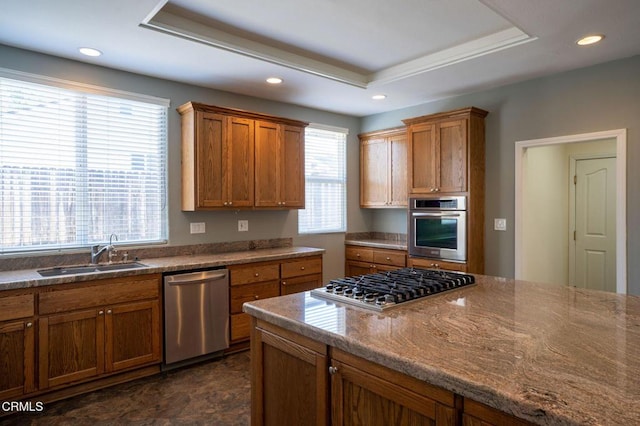 2947 Camino Del Zuro, Thousand Oaks, CA 91360 - kitchen featuring a sink, stainless steel appliances, a raised ceiling, brown cabinets, and recessed lighting