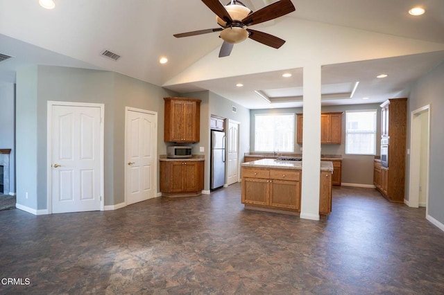 2947 Camino Del Zuro, Thousand Oaks, CA 91360 - kitchen with appliances with stainless steel finishes, brown cabinetry, ceiling fan, baseboards, and recessed lighting