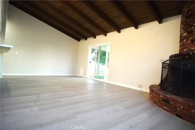 5187 Cedar St, Jurupa Valley, CA 92509 - unfurnished living room with a wooden ceiling with exposed beams, wood finished floors, high vaulted ceiling, and a fireplace