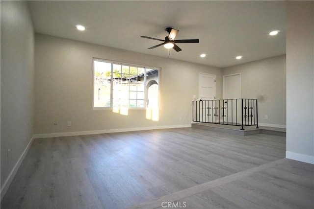 5187 Cedar St, Jurupa Valley, CA 92509 - unfurnished room with wood finished floors, a ceiling fan, and recessed lighting