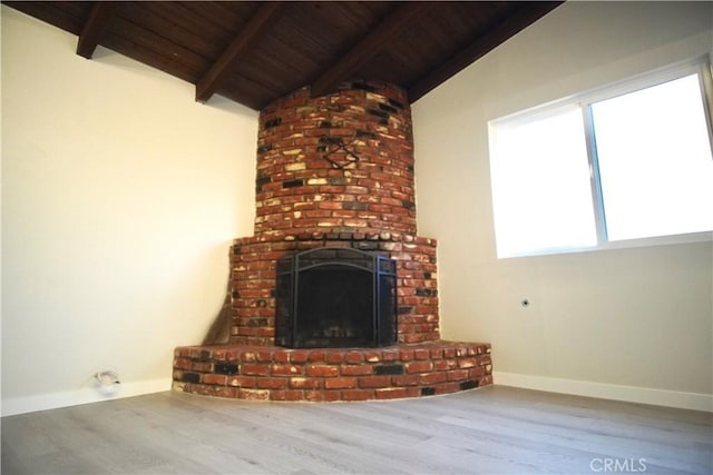 5187 Cedar St, Jurupa Valley, CA 92509 - unfurnished living room with wood ceiling, wood finished floors, and a brick fireplace