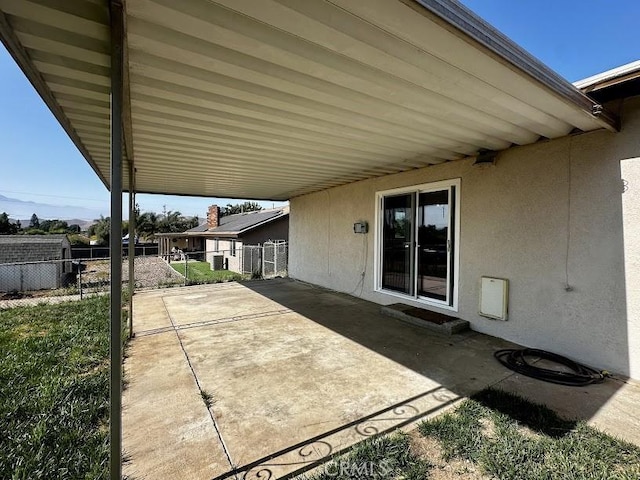 5187 Cedar St, Jurupa Valley, CA 92509 - view of patio / terrace featuring an attached carport