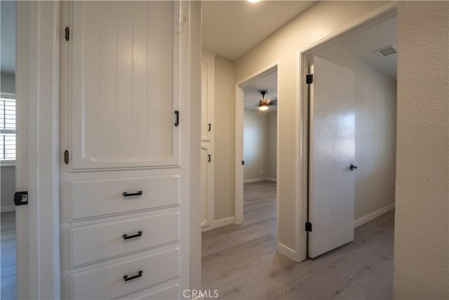 5187 Cedar St, Jurupa Valley, CA 92509 - hall with light wood-type flooring and baseboards