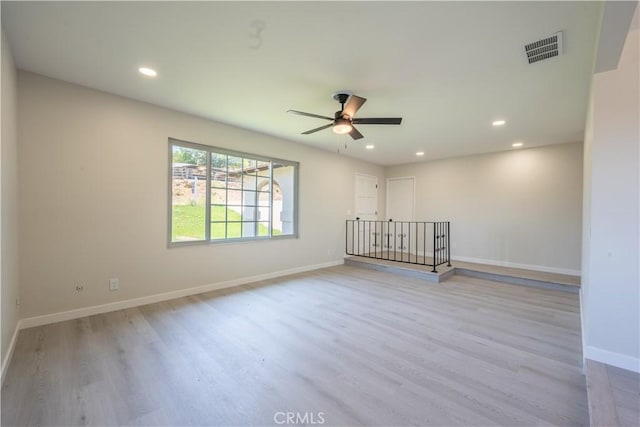 5187 Cedar St, Jurupa Valley, CA 92509 - empty room featuring wood finished floors, a ceiling fan, and recessed lighting