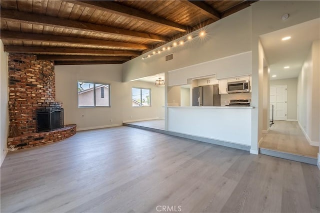 5187 Cedar St, Jurupa Valley, CA 92509 - unfurnished living room with wooden ceiling and light wood-style floors