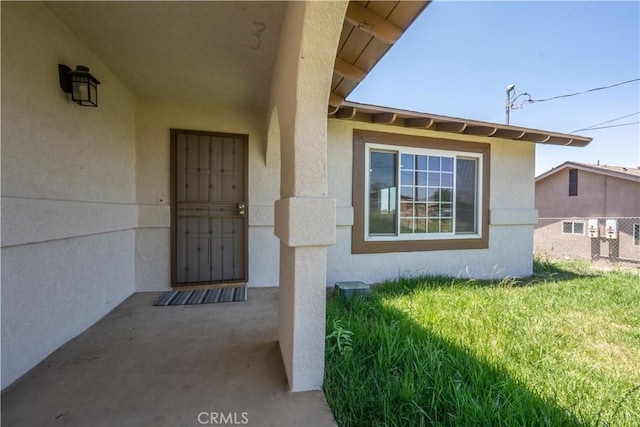 5187 Cedar St, Jurupa Valley, CA 92509 - view of exterior entry with stucco siding