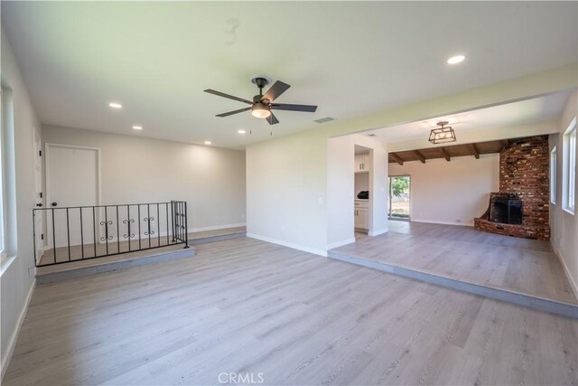 5187 Cedar St, Jurupa Valley, CA 92509 - unfurnished living room featuring light wood-type flooring, recessed lighting, and ceiling fan