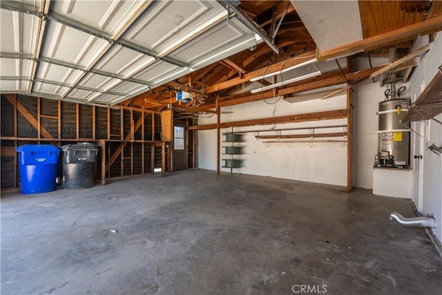5187 Cedar St, Jurupa Valley, CA 92509 - garage with water heater and a garage door opener