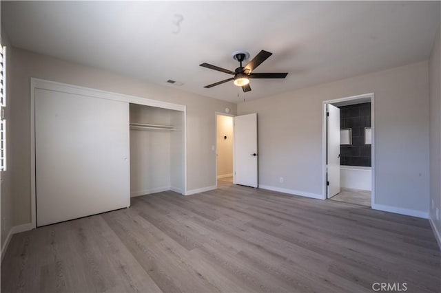 5187 Cedar St, Jurupa Valley, CA 92509 - unfurnished bedroom with a closet, wood finished floors, and ceiling fan