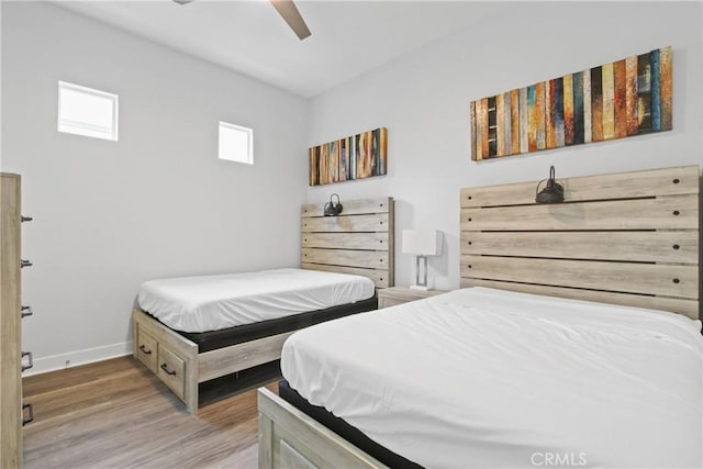 660 Daniel Freeman Cir, Inglewood, CA 90301 - bedroom featuring wood finished floors, baseboards, and a ceiling fan