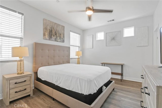660 Daniel Freeman Cir, Inglewood, CA 90301 - bedroom featuring wood finished floors, baseboards, and a ceiling fan