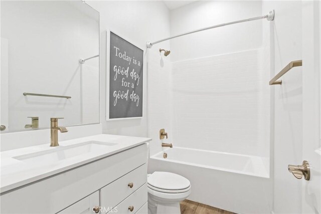 660 Daniel Freeman Cir, Inglewood, CA 90301 - full bathroom with shower / washtub combination, toilet, vanity, and wood finished floors
