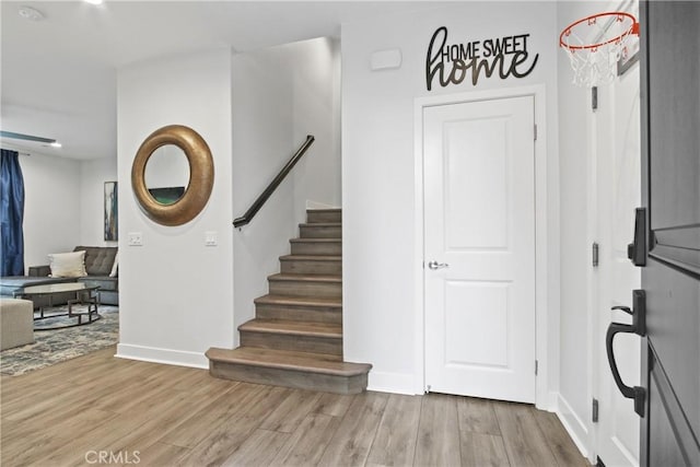 660 Daniel Freeman Cir, Inglewood, CA 90301 - entrance foyer featuring wood finished floors, baseboards, and stairs