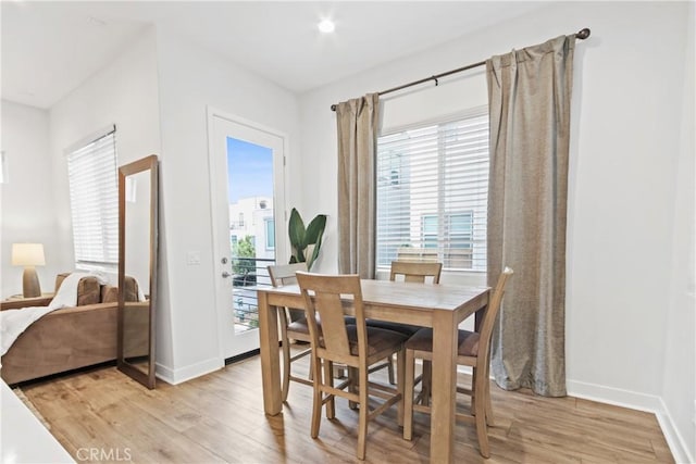 660 Daniel Freeman Cir, Inglewood, CA 90301 - dining space featuring light wood-style floors and baseboards