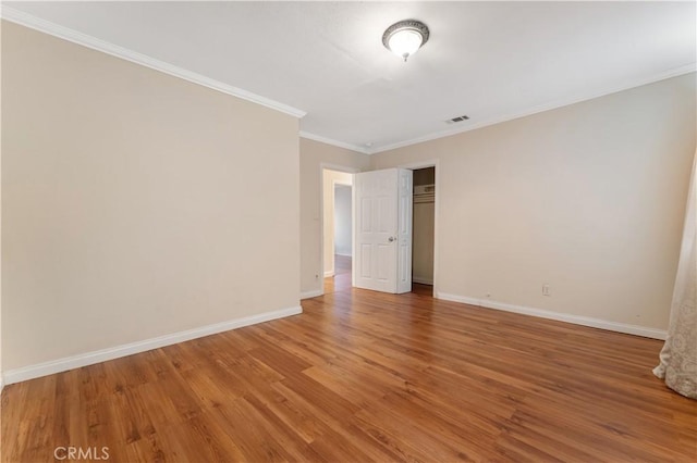 6031 6th Ave, Los Angeles, CA 90043 - unfurnished room featuring baseboards, light wood finished floors, and crown molding