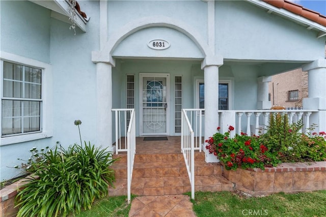 6031 6th Ave, Los Angeles, CA 90043 - entrance to property with stucco siding and covered porch