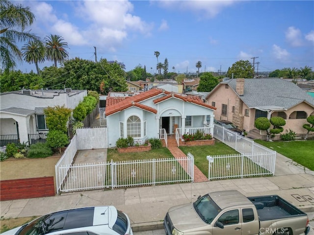 6031 6th Ave, Los Angeles, CA 90043 - mediterranean / spanish-style home with a gate and stucco siding
