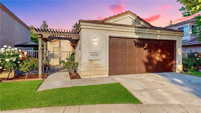 8535 Creekside Pl, Rancho Cucamonga, CA 91730 - view of front of house with a pergola, stucco siding, a tiled roof, and concrete driveway