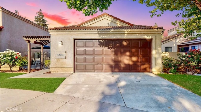 8535 Creekside Pl, Rancho Cucamonga, CA 91730 - view of front facade with a pergola, a detached garage, stucco siding, and a tile roof