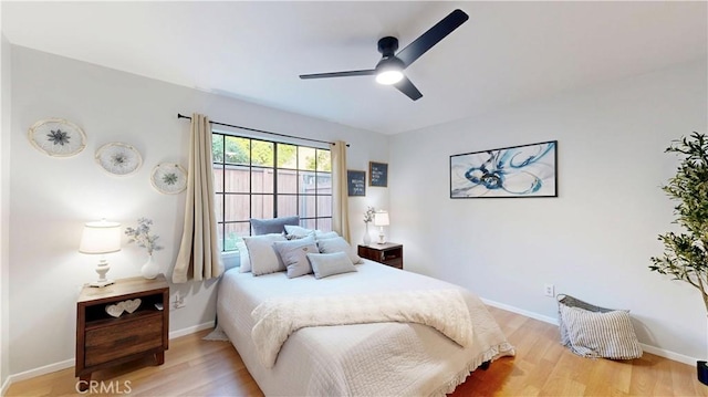 8535 Creekside Pl, Rancho Cucamonga, CA 91730 - bedroom featuring light wood-style floors, baseboards, and a ceiling fan