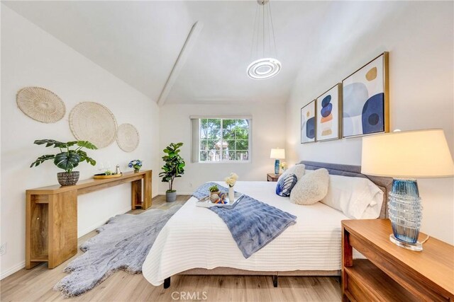 13445 Savanna, Tustin, CA 92782 - bedroom with lofted ceiling and wood finished floors