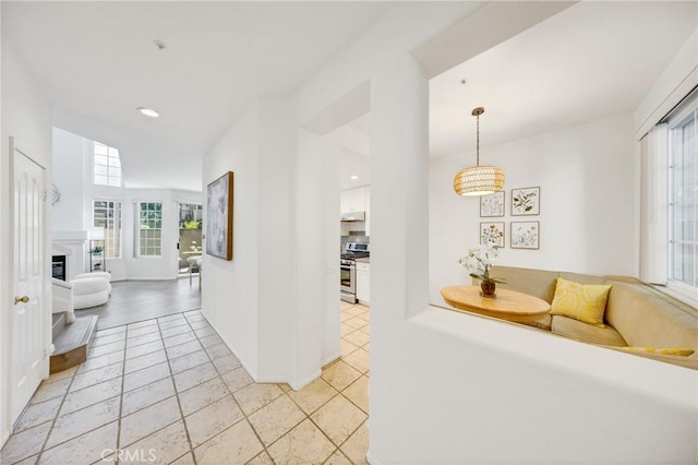 13445 Savanna, Tustin, CA 92782 - corridor featuring plenty of natural light, light tile patterned floors, and recessed lighting