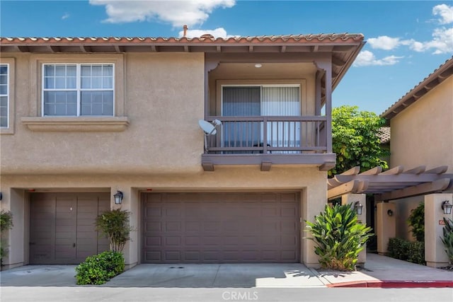 13445 Savanna, Tustin, CA 92782 - multi unit property with a balcony, a garage, and stucco siding