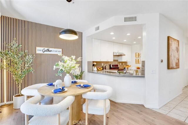 13445 Savanna, Tustin, CA 92782 - dining room featuring light wood finished floors, recessed lighting, and baseboards