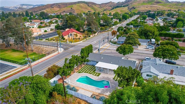 4408 Walnut Ave, Simi Valley, CA 93063 - aerial perspective of suburban area with a mountainous background and a pool