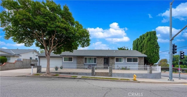 4408 Walnut Ave, Simi Valley, CA 93063 - ranch-style home with a fenced front yard, driveway, and a garage