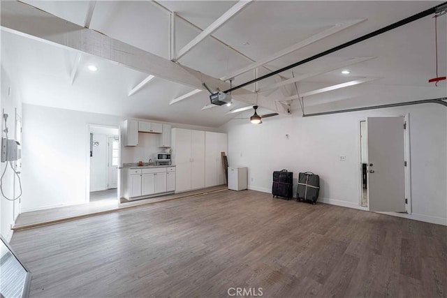 4408 Walnut Ave, Simi Valley, CA 93063 - garage with a garage door opener, baseboards, and recessed lighting