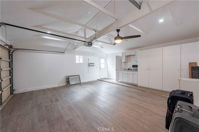 4408 Walnut Ave, Simi Valley, CA 93063 - garage with a garage door opener, ceiling fan, a wall mounted AC, recessed lighting, and baseboards