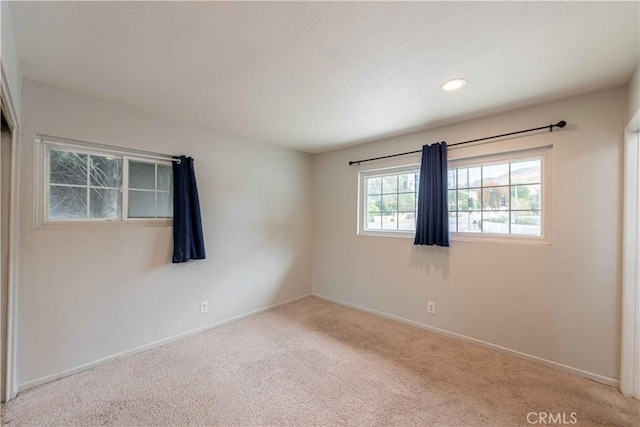 4408 Walnut Ave, Simi Valley, CA 93063 - carpeted empty room featuring baseboards and recessed lighting
