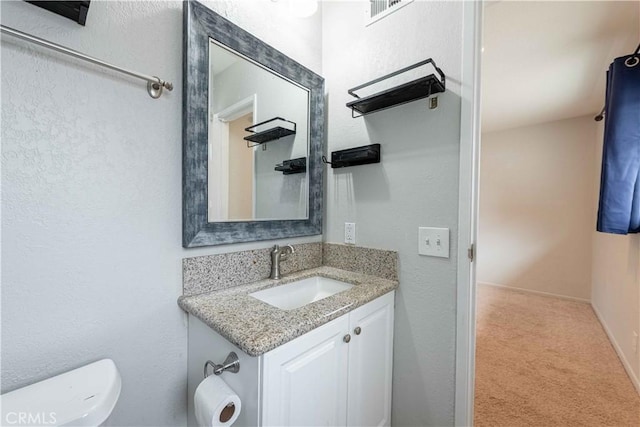 4408 Walnut Ave, Simi Valley, CA 93063 - bathroom featuring vanity, toilet, and a textured wall