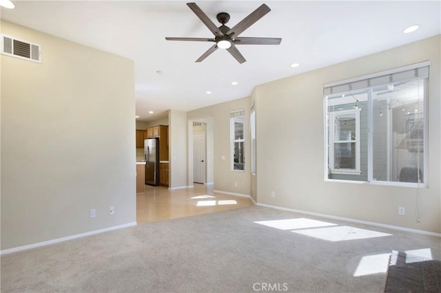 2 Hydrangea St, Ladera Ranch, CA 92694 - unfurnished living room with light colored carpet, a ceiling fan, baseboards, and recessed lighting