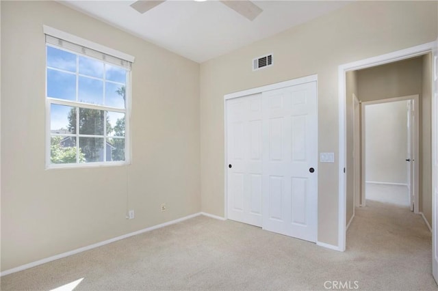 2 Hydrangea St, Ladera Ranch, CA 92694 - unfurnished bedroom with light carpet, baseboards, a closet, and ceiling fan
