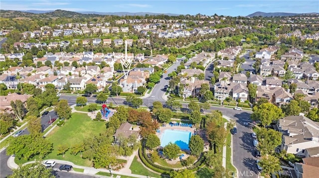 2 Hydrangea St, Ladera Ranch, CA 92694 - view of property location featuring a mountainous background, nearby suburban area, and a pool