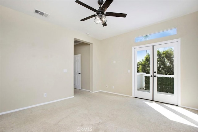 2 Hydrangea St, Ladera Ranch, CA 92694 - spare room featuring light carpet, a ceiling fan, baseboards, and french doors