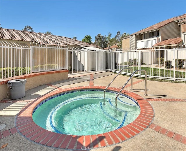 44 Carriage Way Unit 108, Pomona, CA 91766 - view of swimming pool featuring a hot tub and a patio area