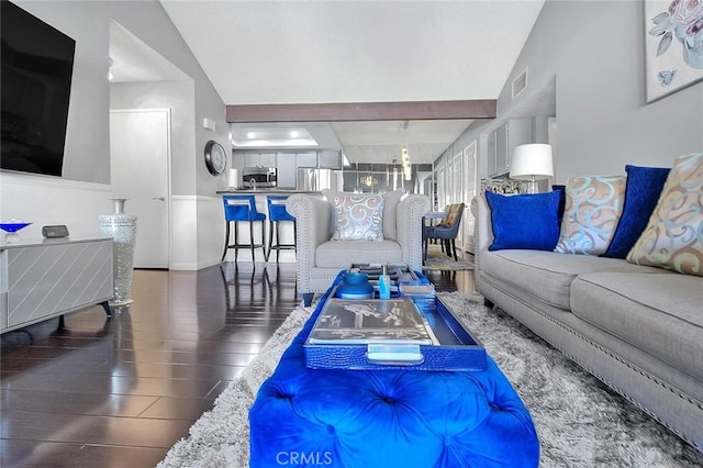 44 Carriage Way Unit 108, Pomona, CA 91766 - living room with wood finished floors, lofted ceiling, and baseboards