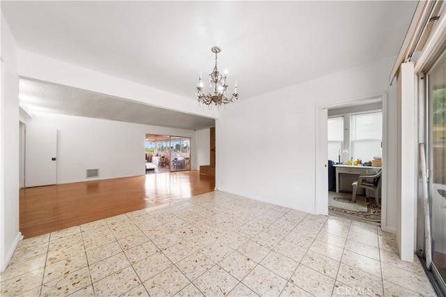 2917 W Hellman Ave, Alhambra, CA 91803 - empty room featuring a chandelier