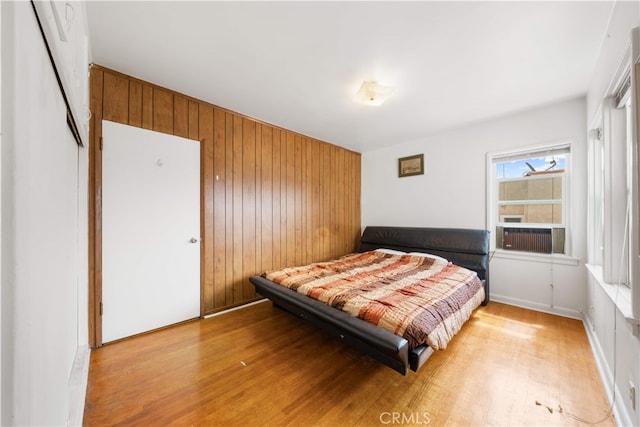 2917 W Hellman Ave, Alhambra, CA 91803 - bedroom featuring wood finished floors, wooden walls, and cooling unit