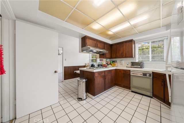 2917 W Hellman Ave, Alhambra, CA 91803 - kitchen featuring white appliances, light countertops, under cabinet range hood, wainscoting, and a peninsula