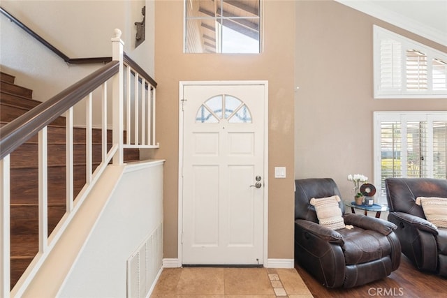 13179 Lone Stallion Ln, Corona, CA 92883 - entrance foyer with a towering ceiling, baseboards, stairs, and tile patterned floors