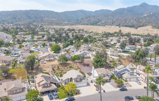 13179 Lone Stallion Ln, Corona, CA 92883 - aerial view of property and surrounding area featuring nearby suburban area and a mountain backdrop