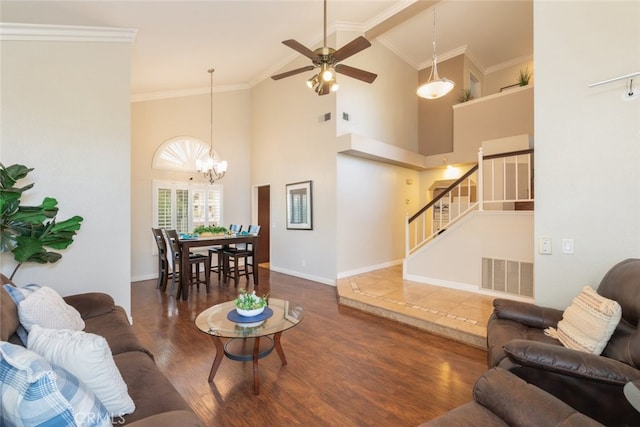 13179 Lone Stallion Ln, Corona, CA 92883 - living area with wood finished floors, a chandelier, stairs, a ceiling fan, and baseboards