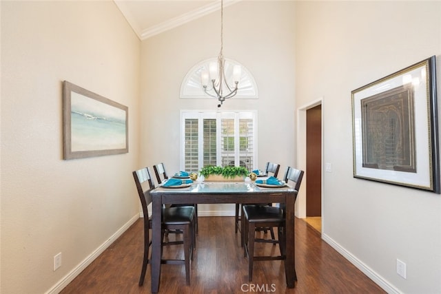 13179 Lone Stallion Ln, Corona, CA 92883 - dining area with dark wood-type flooring, a chandelier, baseboards, and crown molding