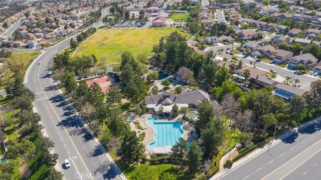 13179 Lone Stallion Ln, Corona, CA 92883 - aerial view of property and surrounding area with a pool and nearby suburban area