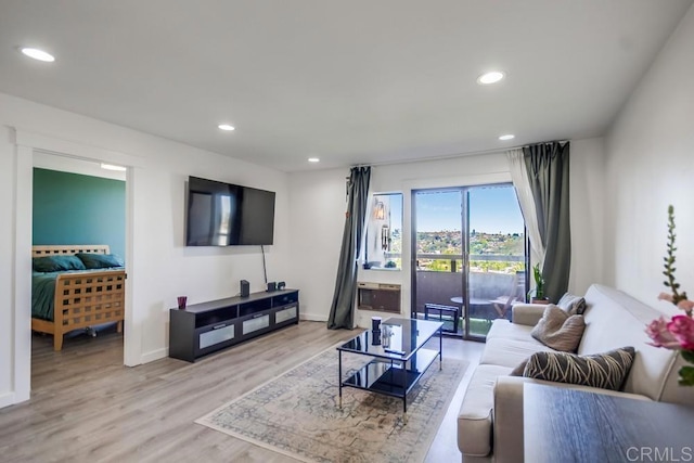 6930 Hyde Park Dr Unit 218, San Diego, CA 92119 - living room with wood finished floors, recessed lighting, and baseboards